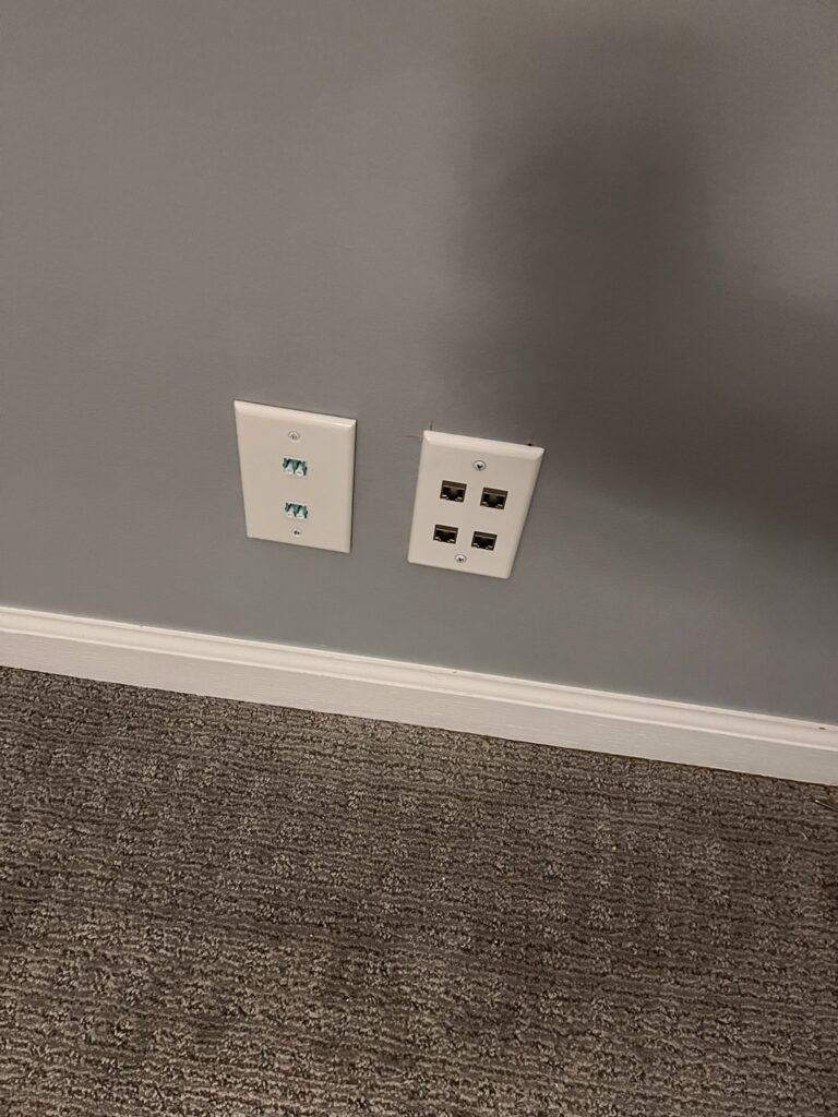 Fiber wall plate next to a Cat 6a wall plate I installed